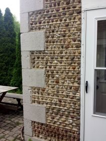 Corner of the patio shows cobble detail.