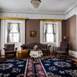 The Main Parlor is a large room, holding 15 people at capacity, that hosts groups both formal and informal. January 2020,